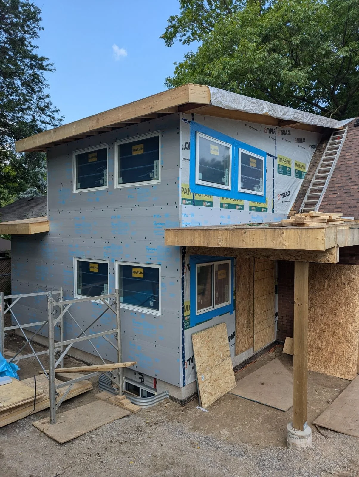 Exterior Renovation In Progress by Go Hard Corporation